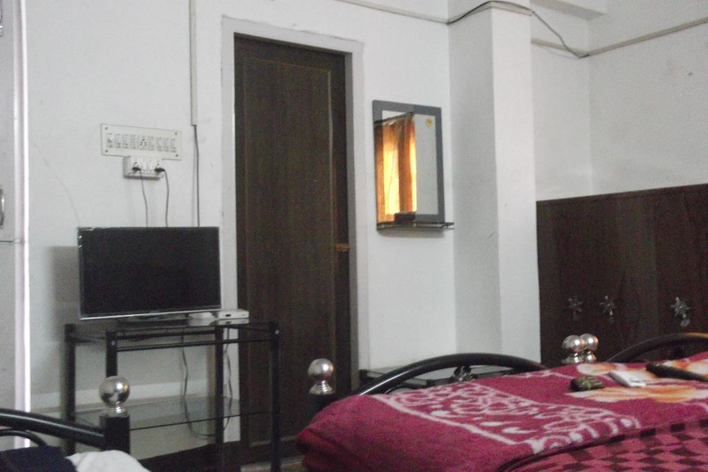 Megacity Inn Kalkutta Zimmer foto