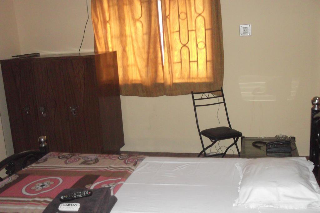 Megacity Inn Kalkutta Zimmer foto